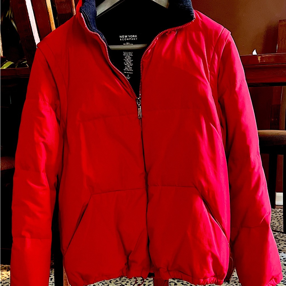 Very warm - Gently worn Red Ski Jacket with removable zippered sleeves.